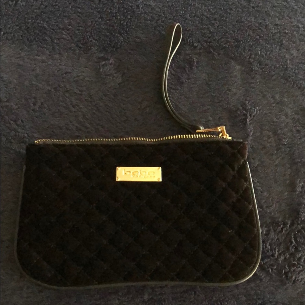 BEBE black suede wristlet